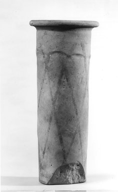  <em>Cylindrical Vase</em>. Terracotta, Height: 10 11/16 in. (27.2 cm). Brooklyn Museum, Charles Edwin Wilbour Fund, 09.889.695. Creative Commons-BY (Photo: Brooklyn Museum, CUR.09.889.695_NegA_print_bw.jpg)