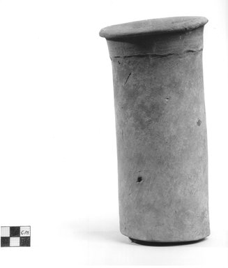  <em>Cylindrical Vase</em>. Clay, slip, Height: 8 3/8 in. (21.2 cm). Brooklyn Museum, Charles Edwin Wilbour Fund, 09.889.715. Creative Commons-BY (Photo: Brooklyn Museum, CUR.09.889.715_NegA_print_bw.jpg)