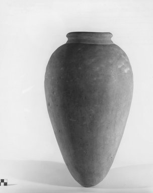  <em>Storage Pot</em>. Terracotta, 19 5/16 x 10 1/4 x 10 1/4 in. (49 x 26 x 26 cm). Brooklyn Museum, Charles Edwin Wilbour Fund, 09.889.744. Creative Commons-BY (Photo: Brooklyn Museum, CUR.09.889.744_NegA_print_bw.jpg)