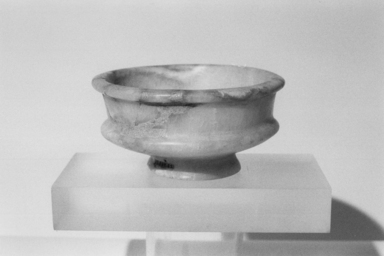  <em>Tazza</em>, ca. 1479–1390 B.C.E. Egyptian alabaster (calcite), 2 3/16 x 4 3/8 in. (5.5 x 11.1 cm). Brooklyn Museum, Charles Edwin Wilbour Fund, 09.889.82. Creative Commons-BY (Photo: Brooklyn Museum, CUR.09.889.82_NegL1011_19_print_bw.jpg)