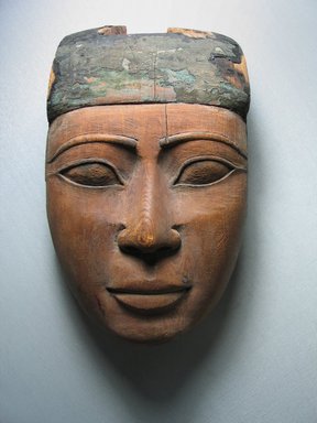 <em>Mask for Sarcophagus</em>. Wood, 10 3/16 x 6 1/4 x 4 3/16 in. (25.8 x 15.8 x 10.7 cm). Brooklyn Museum, Charles Edwin Wilbour Fund, 09.889.847. Creative Commons-BY (Photo: Brooklyn Museum, CUR.09.889.847_view1.jpg)