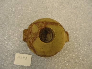  <em>Small Urn</em>. Breccia, 1 13/16 x Diam. 3 3/8 in. (4.6 x 8.5 cm). Brooklyn Museum, Charles Edwin Wilbour Fund, 09.889.8. Creative Commons-BY (Photo: Brooklyn Museum, CUR.09.889.8_top.jpg)