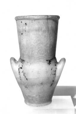  <em>Amphora with Painted Floral Collar</em>, ca. 1292–1075 B.C.E. Egyptian alabaster, traces of paint, 7 9/16 x 4 3/4 x diam. 3 11/16 in. (19.2 x 12 x 9.4 cm). Brooklyn Museum, Charles Edwin Wilbour Fund, 09.889.92. Creative Commons-BY (Photo: Brooklyn Museum, CUR.09.889.92_NegL1011_3_print_bw.jpg)