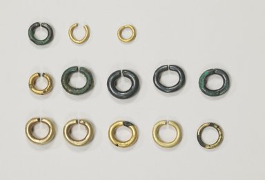  <em>Earring, 1 of 6</em>, 6th century. Gilt bronze, Diameter: 1 1/8 in. (2.8 cm). Brooklyn Museum, 09.907.4. Creative Commons-BY (Photo: , CUR.09.907.1-.13_Collins_photo_NRICH.jpg)