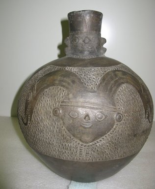 Chimú. <em>Face Neck Jar</em>, 1100-1470. Ceramic, 13 1/2 x 10 x 7 1/2 in. (34.3 x 25.4 x 19.1 cm). Brooklyn Museum, Brooklyn Museum Collection, 11.28. Creative Commons-BY (Photo: Brooklyn Museum, CUR.11.28.jpg)