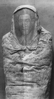  <em>Mummy and Portrait of Demetrios</em>, 95-100 C.E. Painted cloth, gold, human remains, wood, encaustic, gold leaf, 13 3/8 x 15 3/8 x 74 13/16 in., 130 lb. (34 x 39 x 190 cm, 58.97kg). Brooklyn Museum, Charles Edwin Wilbour Fund, 11.600. Creative Commons-BY (Photo: Brooklyn Museum, CUR.11.600_NegA_print_bw.jpg)
