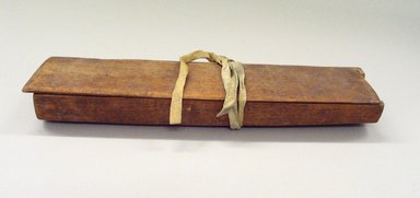 Osage. <em>Feather Box [with lid]</em>, late 19th–early 20th century. Box elder wood, leather, 1 15/16 x 4 1/4 x 17 1/2 in.  (5.0 x 10.8 x 44.5 cm). Brooklyn Museum, Museum Expedition 1911, Museum Collection Fund, 11.694.8980. Creative Commons-BY (Photo: Brooklyn Museum, CUR.11.694.8980_view1.jpg)