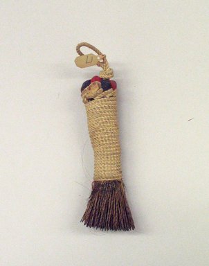Osage. <em>Hair Brush</em>, early 19th-20th century. Sticks, fabric, grasses, 6 5/16 x 1 15/16 x 1 1/16 in.  (16.0 x 5.0 x 2.7 cm). Brooklyn Museum, Museum Expedition 1911, Museum Collection Fund, 11.694.8989. Creative Commons-BY (Photo: Brooklyn Museum, CUR.11.694.8989.jpg)
