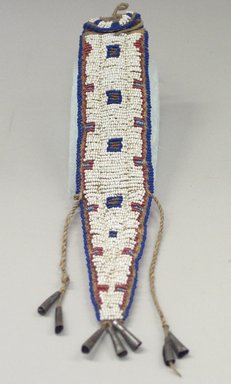 Osage. <em>Knife Sheath</em>, late 19th-early 20th century. Hide, bead, tin, 5/16 x 1 5/8 x 9 13/16 in.  (0.8 x 4.2 x 25.0 cm). Brooklyn Museum, Museum Expedition 1911, Museum Collection Fund, 11.694.9004. Creative Commons-BY (Photo: Brooklyn Museum, CUR.11.694.9004_view1.jpg)