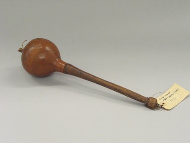 Osage. <em>Rattle</em>, late 19th-early 20th century. Gourd, wood, hide, teeth?, 14 1/2 x 3 1/2 x 3 1/2 in. (36.8 x 8.9 x 8.9 cm). Brooklyn Museum, Museum Expedition 1911, Museum Collection Fund, 11.694.9020. Creative Commons-BY (Photo: Brooklyn Museum, CUR.11.694.9020.jpg)
