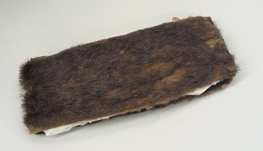 Osage. <em>Headband</em>, late 19th-early 20th century. Otter skin, cloth, bead, felt, 9 13/16 x 4 5/16 in.  (25.0 x 11.0 cm). Brooklyn Museum, Museum Expedition 1911, Museum Collection Fund, 11.694.9029. Creative Commons-BY (Photo: Brooklyn Museum, CUR.11.694.9029.jpg)