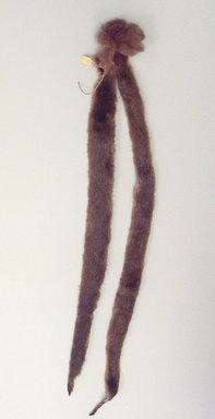 Osage. <em>Pendant tied to Scalp Lock</em>, late 19th-early 20th century. Otter skin, hide, buffalo hair, 1 9/16 x 1 9/16 x 36 1/4 in.  (4 x 4 x 92.0 cm). Brooklyn Museum, Museum Expedition 1911, Museum Collection Fund, 11.694.9033. Creative Commons-BY (Photo: Brooklyn Museum, CUR.11.694.9033.jpg)
