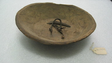 Ainu. <em>Soft Round Dish or Bowl</em>. Wood, 2 3/8 x 9 1/4 in. (6 x 23.5 cm). Brooklyn Museum, Gift of Herman Stutzer, 12.145a. Creative Commons-BY (Photo: , CUR.12.145a.jpg)