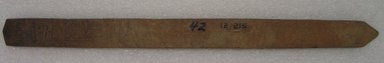 Ainu. <em>Long Plain Prayer Stick</em>. Wood, 1 x 13 1/8 in. (2.5 x 33.4 cm). Brooklyn Museum, Gift of Herman Stutzer, 12.215. Creative Commons-BY (Photo: Brooklyn Museum, CUR.12.215_bottom.jpg)