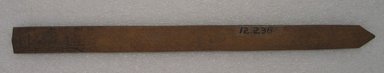 Ainu. <em>Long Straight Prayer Stick</em>. Wood, 1 x 13 1/4 in. (2.5 x 33.7 cm). Brooklyn Museum, Gift of Herman Stutzer, 12.238. Creative Commons-BY (Photo: Brooklyn Museum, CUR.12.238_bottom.jpg)