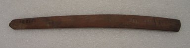 Ainu. <em>Long Curved Prayer Stick</em>. Wood, 1 x 12 5/16 in. (2.5 x 31.3 cm). Brooklyn Museum, Gift of Herman Stutzer, 12.255. Creative Commons-BY (Photo: Brooklyn Museum, CUR.12.255_bottom.jpg)