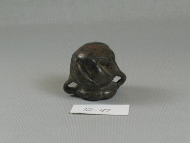 Roman. <em>Two-handled Pot Imitating Stone</em>, 4th-5th century C.E. Glass, 1 9/16 x 1 7/16 x 1 7/8 in. (3.9 x 3.6 x 4.7 cm). Brooklyn Museum, Gift of Aziz Khayat, 12.47. Creative Commons-BY (Photo: Brooklyn Museum, CUR.12.47_bottom.jpg)