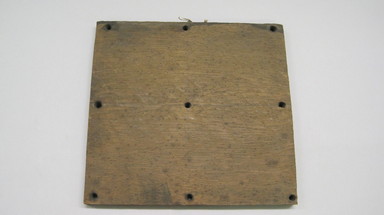 Ainu. <em>Square Board with Nine Pins for Game</em>. Wood Brooklyn Museum, Gift of Herman Stutzer, 12.648a. Creative Commons-BY (Photo: , CUR.12.648a.jpg)