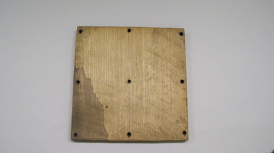 Ainu. <em>Square Board with Pins (Missing) for Game</em>. Wood Brooklyn Museum, Gift of Herman Stutzer, 12.648c. Creative Commons-BY (Photo: , CUR.12.648c.jpg)