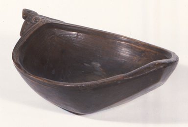 Ainu. <em>Bowl with One Carved Handle</em>, late 19th-early 20th century. Wood, 3 3/8 x 11 1/4 in. (8.6 x 28.6 cm). Brooklyn Museum, Gift of Herman Stutzer, 12.683. Creative Commons-BY (Photo: Brooklyn Museum, CUR.12.683.jpg)