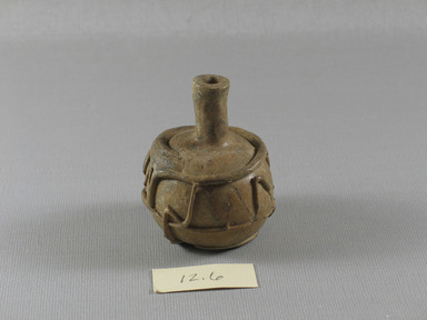 Islamic. <em>Bottle of Blown Glass</em>, 7th-8th century C.E. Glass, 2 7/16 x Diam. 2 in. (6.2 x 5.1 cm). Brooklyn Museum, Gift of Aziz Khayat, 12.6. Creative Commons-BY (Photo: Brooklyn Museum, CUR.12.6_view1.jpg)