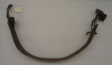Ainu. <em>Back Piece of Loom</em>. Wood, 2 9/16 x 15 1/2 in. (6.5 x 39.4 cm). Brooklyn Museum, Gift of Herman Stutzer, 12.769. Creative Commons-BY (Photo: Brooklyn Museum, CUR.12.769_side1.jpg)