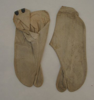  <em>Fireman's Uniform</em>, 19th century. Cotton, (tabi socks): 3 15/16 x 3 11/16 x 9 5/8 in. (10 x 9.4 x 24.5 cm). Brooklyn Museum, Museum Expedition 1912, Museum Collection Fund, 12.81.1-.9. Creative Commons-BY (Photo: Brooklyn Museum, CUR.12.81e-f_view1.jpg)