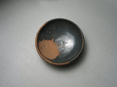 Greek. <em>Small Shallow Bowl</em>, 450-350 B.C.E. Clay, pigment, 1 x 3 1/4 in. (2.6 x 8.2 cm). Brooklyn Museum, Gift of the Egypt Exploration Society, 12.907. Creative Commons-BY (Photo: Brooklyn Museum, CUR.12.907_view3.jpg)