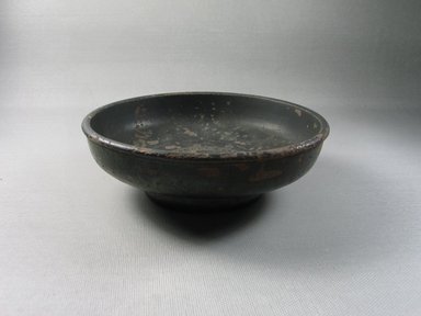 Greek-Attic. <em>Bowl with Graffito on Bottom</em>, 420 B.C.E., or later. Clay, slip, 1 15/16 x Diam. 6 1/8 in. (4.9 x 15.5 cm). Brooklyn Museum, Gift of the Egypt Exploration Society, 12.908. Creative Commons-BY (Photo: Brooklyn Museum, CUR.12.908_view1.jpg)