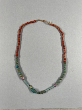  <em>Single-strand Necklace</em>, ca. 2008-1630 B.C.E. Faience, amethyst, carnelian, As strung, greatest diam. 1/4 × 17 5/16 in. (0.7 × 44 cm). Brooklyn Museum, Gift of the Egypt Exploration Society, 12.911.6. Creative Commons-BY (Photo: Brooklyn Museum, CUR.12.911.6_view01.jpg)