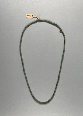  <em>Single-strand Necklace</em>. Faience, Greatest diam. 1/8 × 24 13/16 in. (0.3 × 63 cm). Brooklyn Museum, Gift of the Egypt Exploration Society, 12.911.8. Creative Commons-BY (Photo: Brooklyn Museum, CUR.12.911.8_view01-1.jpg)