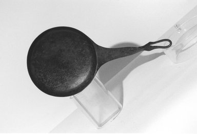  <em>Ladle or Shallow Pan in Form of Goose's Neck</em>, ca. 1479-1400 B.C.E. Bronze, 4 9/16 x 9 3/8 in. (11.6 x 23.8 cm). Brooklyn Museum, Gift of the Egypt Exploration Fund, 13.1045. Creative Commons-BY (Photo: Brooklyn Museum, CUR.13.1045_NegL1012_32_print_bw.jpg)