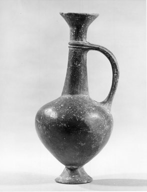 Cypriot. <em>Reddish-Brown Vase</em>, ca. 1539-1292 B.C.E. Terracotta, 5 13/16 x Diam. 2 1/2 in. (14.8 x 6.3 cm). Brooklyn Museum, Gift of the Egypt Exploration Fund, 13.1047. Creative Commons-BY (Photo: Brooklyn Museum, CUR.13.1047_bw.jpg)