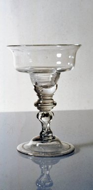 <em>Low Lipped Rectangular Baluster Stem</em>, ca. 1700-1800. Glass, 5 x 4 1/2 in. (12.7 x 11.4 cm). Brooklyn Museum, Purchased by Special Subscription and Museum Collection Fund, 13.627. Creative Commons-BY (Photo: Brooklyn Museum, CUR.13.627.jpg)