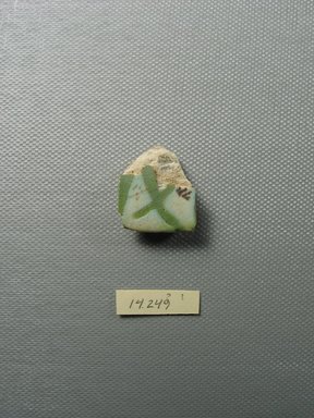  <em>Faience Fragment</em>. Faience, 13/16 x 5/16 x 1 in. (2 x 0.8 x 2.5 cm). Brooklyn Museum, 14.249. Creative Commons-BY (Photo: Brooklyn Museum, CUR.14.249_view01.jpg)