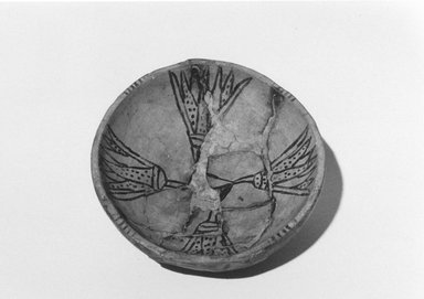  <em>Bowl with Lotus Design</em>, ca. 1479-1400 B.C.E. Faience, 1 1/4 × Diam. 4 1/8 in. (3.2 × 10.5 cm). Brooklyn Museum, Gift of the Egypt Exploration Fund, 14.610. Creative Commons-BY (Photo: Brooklyn Museum, CUR.14.610_NegID_L1007_14_print_bw.jpg)