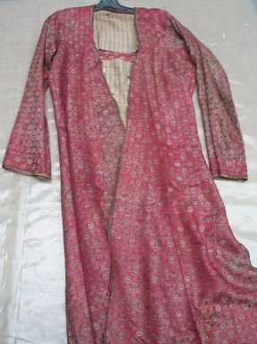  <em>Male Coat</em>, late 19th - early 20th century. Brocade, Metallic thread, Silk, Shoulder to Shoulder: 14 9/16 x 46 1/16 in. (37 x 117 cm). Brooklyn Museum, Museum Expedition 1913-1914, Museum Collection Fund, 14.721. Creative Commons-BY (Photo: Brooklyn Museum, CUR.14.721_overall.jpg)