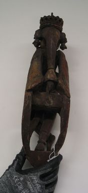 <em>Standing Figurine of a Musician</em>. Carved wood and polychrome, 15 1/2 in. (39.4 cm). Brooklyn Museum, 14.732.1. Creative Commons-BY (Photo: Brooklyn Museum, CUR.14.732.1_back.jpg)