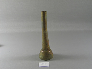 Roman. <em>Bottle</em>, 1st-5th century C.E. Glass, 6 1/8 x Diam. 1 15/16 in. (15.6 x 5 cm). Brooklyn Museum, Gift of Robert B. Woodward, 15.21. Creative Commons-BY (Photo: Brooklyn Museum, CUR.15.21_view1.jpg)