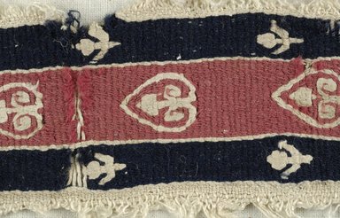Coptic. <em>Band Fragment with Botanical Decoration</em>, 5th-6th century C.E. Flax, wool, 2 x 7 in. (5.1 x 17.8 cm). Brooklyn Museum, Gift of the Egypt Exploration Fund, 15.456. Creative Commons-BY (Photo: Brooklyn Museum (in collaboration with Index of Christian Art, Princeton University), CUR.15.456_detail01_ICA.jpg)