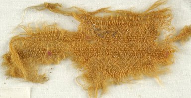 Coptic. <em>Fragment of Tabby Weave</em>, 5th-6th century C.E. Wool, 2 x 5 in. (5.1 x 12.7 cm). Brooklyn Museum, Gift of the Egypt Exploration Fund, 15.475k. Creative Commons-BY (Photo: Brooklyn Museum (in collaboration with Index of Christian Art, Princeton University), CUR.15.475K_ICA.jpg)