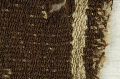 Coptic. <em>Fragment of Tabby Weave</em>, 5th-6th century C.E. Wool, 2 x 7 in. (5.1 x 17.8 cm). Brooklyn Museum, Gift of the Egypt Exploration Fund, 15.475w. Creative Commons-BY (Photo: Brooklyn Museum (in collaboration with Index of Christian Art, Princeton University), CUR.15.475W_detail01_ICA.jpg)