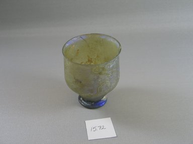 Roman. <em>Small Goblet</em>, 1st-4th century C.E. Glass, 3 7/16 x greatest diam. 2 13/16 in. (8.8 x 7.2 cm). Brooklyn Museum, Gift of R. B. Woodward, 15.72. Creative Commons-BY (Photo: Brooklyn Museum, CUR.15.72.jpg)