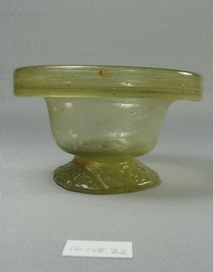 Egypto-Roman. <em>Bowl</em>, 4th century C.E. Glass, 2 5/16 x Diam. 4 1/8 in. (5.8 x 10.4 cm). Brooklyn Museum, Gift of Evangeline Wilbour Blashfield, Theodora Wilbour, and Victor Wilbour honoring the wishes of their mother, Charlotte Beebe Wilbour, as a memorial to their father, Charles Edwin Wilbour, 16.108.22. Creative Commons-BY (Photo: Brooklyn Museum, CUR.16.108.22_view2.jpg)