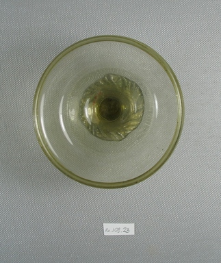 Egypto-Roman. <em>Bowl</em>, 4th century C.E. Glass, 2 3/16 x Diam. 3 3/4 in. (5.6 x 9.5 cm). Brooklyn Museum, Gift of Evangeline Wilbour Blashfield, Theodora Wilbour, and Victor Wilbour honoring the wishes of their mother, Charlotte Beebe Wilbour, as a memorial to their father, Charles Edwin Wilbour, 16.108.23. Creative Commons-BY (Photo: Brooklyn Museum, CUR.16.108.23_view3.jpg)