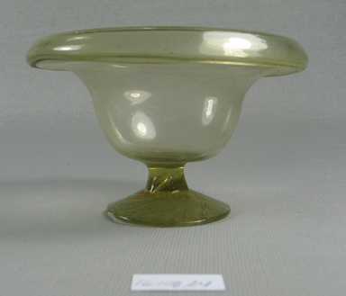 Egypto-Roman. <em>Bowl</em>, 4th century C.E. Glass, 2 5/16 x diam. 3 7/8 in. (5.8 x 9.8 cm). Brooklyn Museum, Gift of Evangeline Wilbour Blashfield, Theodora Wilbour, and Victor Wilbour honoring the wishes of their mother, Charlotte Beebe Wilbour, as a memorial to their father, Charles Edwin Wilbour, 16.108.24. Creative Commons-BY (Photo: Brooklyn Museum, CUR.16.108.24_view2.jpg)