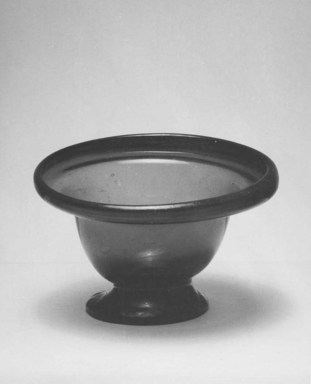 Egypto-Roman. <em>Bowl</em>, 4th century C.E. Glass, 2 1/16 x Diam. 3 9/16 in. (5.2 x 9.1 cm). Brooklyn Museum, Gift of Evangeline Wilbour Blashfield, Theodora Wilbour, and Victor Wilbour honoring the wishes of their mother, Charlotte Beebe Wilbour, as a memorial to their father, Charles Edwin Wilbour, 16.108.7. Creative Commons-BY (Photo: Brooklyn Museum, CUR.16.108.7_NegA_print_bw.jpg)