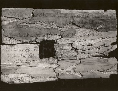 <em>Scribe's Board</em>, ca. 1514-1493 B.C.E. Wood, ink, 14 1/16 x 9 x 3/8 in. (35.7 x 22.8 x 0.9 cm). Brooklyn Museum, Gift of Evangeline Wilbour Blashfield, Theodora Wilbour, and Victor Wilbour honoring the wishes of their mother, Charlotte Beebe Wilbour, as a memorial to their father, Charles Edwin Wilbour, 16.120. Creative Commons-BY (Photo: Brooklyn Museum, CUR.16.120_NegE_print_bw.jpg)