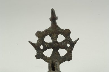 Coptic. <em>Lamp with Elaborate Handle</em>, 5th-6th century C.E. Bronze, 1 5/8 x 3 3/8 in. (4.2 x 8.6 cm). Brooklyn Museum, Gift of Evangeline Wilbour Blashfield, Theodora Wilbour, and Victor Wilbour honoring the wishes of their mother, Charlotte Beebe Wilbour, as a memorial to their father, Charles Edwin Wilbour, 16.133. Creative Commons-BY (Photo: Brooklyn Museum (in collaboration with Index of Christian Art, Princeton University), CUR.16.133_detail01_ICA.jpg)