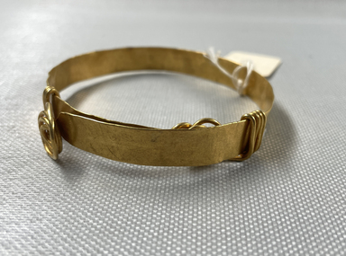 Egypto-Roman. <em>Bracelet</em>, 3rd century C.E. Gold, width: 3/8 in. (1 cm); diameter: 3 7/8 in. (9.8 cm). Brooklyn Museum, Gift of Evangeline Wilbour Blashfield, Theodora Wilbour, and Victor Wilbour honoring the wishes of their mother, Charlotte Beebe Wilbour, as a memorial to their father, Charles Edwin Wilbour, 16.145. Creative Commons-BY (Photo: Brooklyn Museum, CUR.16.145_overall01.JPG)